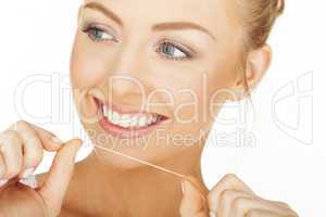 blonde woman teeth cleaning