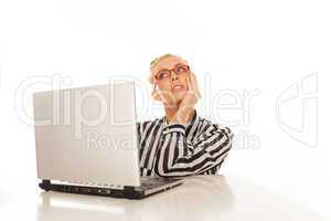 businesswoman working on laptop dreaming