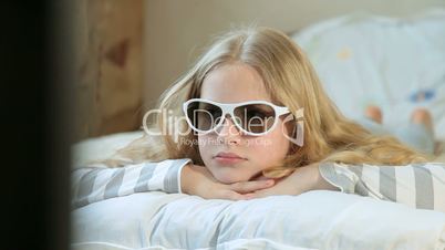 Little Girl Watching 3D TV at Home
