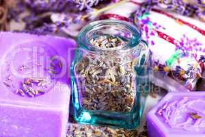 Lavender flowers with soap and glass