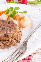 grill chop, buckwheat groats and roasted radishes