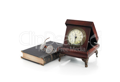 Old Clock And Book