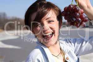 Girl Eating Grapes