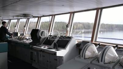 navigation officer driving the cruise liner on the river 2
