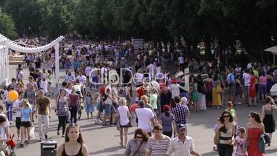 People walking at Park Kultury at the Children's day.