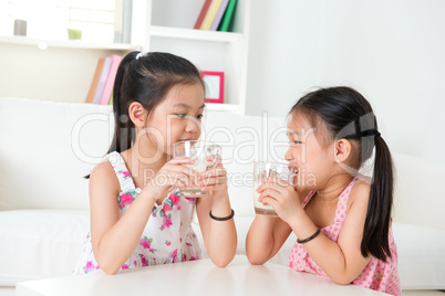 Children drinking milk.