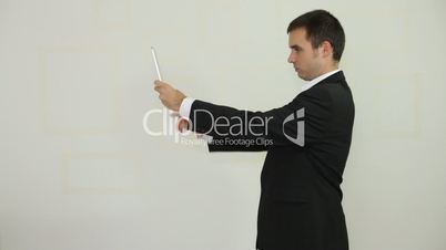 Businessman photographing with tablet