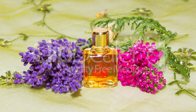 Essential oil with fresh flowers