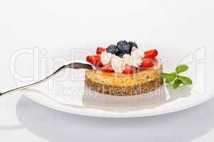Cheesecake, blueberries and strawberries
