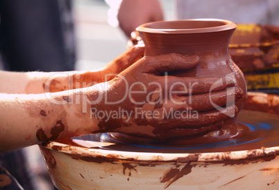 potter making the pot in traditional style.