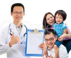 Chinese male medical doctor and young patient family