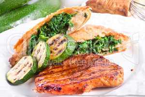 grilled steaks with puff pastry bag and zucchini