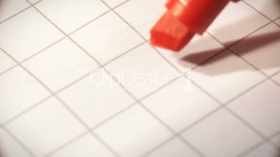 Hand drawing punctuation marks on paper macro