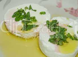 Tomino cheese with rucola and olive oil