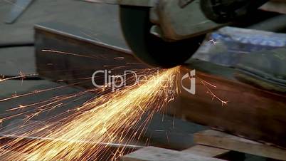 Trimming of the metal channel bars with an Angle Grinder.