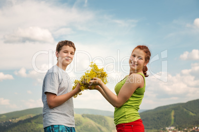 Friends walk in the field