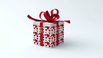 White gift box with red hearts opening