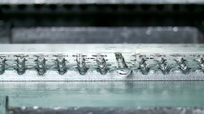 Mounting Presses of the plastic heads on nails, that used for fixing thermal insulation.