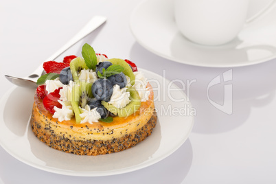 Cheese-cake, strawberry, blueberry and kiwi