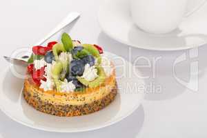 Cheese-cake, strawberry, blueberry and kiwi