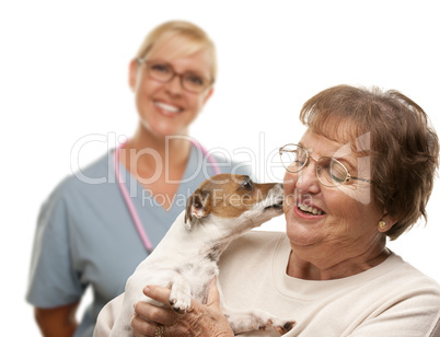 Happy Senior Woman with Dog and Veterinarian