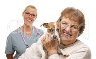 Happy Senior Woman with Dog and Veterinarian
