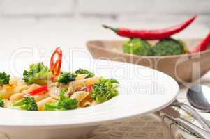 Italian penne pasta with broccoli and chili pepper