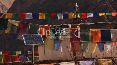 Solar panel among Tibetan prayer flags.
