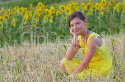 beautiful girl on field in summer