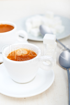 Italian espresso coffee and sugar cubes