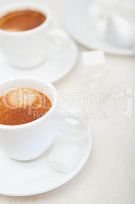 Italian espresso coffee and sugar cubes