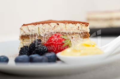 tiramisu dessert with berries and cream