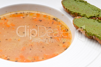 Italian minestrone soup with pesto crostini on side