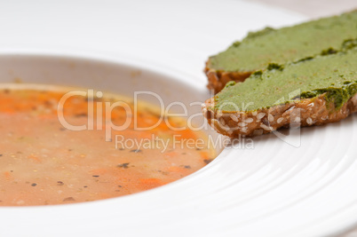 Italian minestrone soup with pesto crostini on side