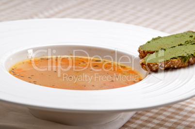 Italian minestrone soup with pesto crostini on side