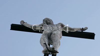 Statue of Jesus Christ below view slow pan in