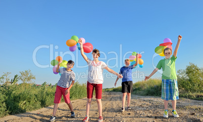 happy children with colorful balloons
