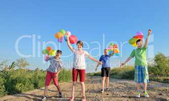 happy children with colorful balloons