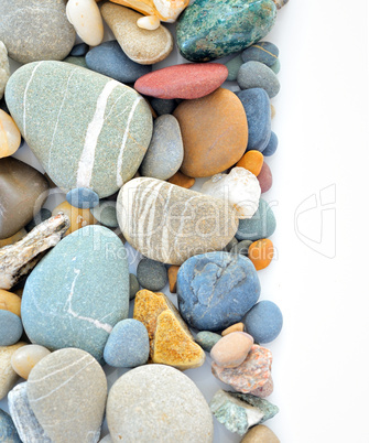 colored stones on white background