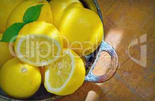 fresh lemons on a wood table