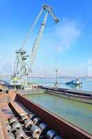 crane and steel plate in harbor