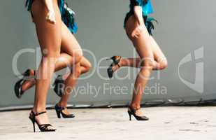feet of girls dancing on stage