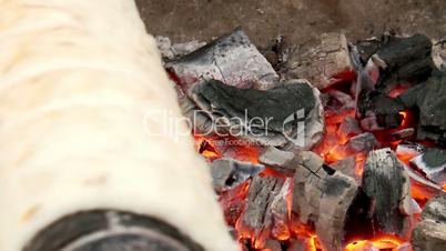 Cooking over charcoal