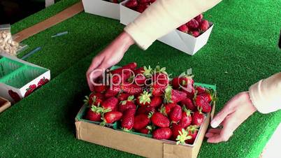 A basket of ripe strawberries on the market