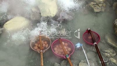 Cooking eggs in a volcanic geyser.