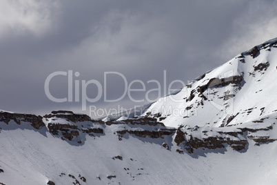 Top of mountains with snow cornice