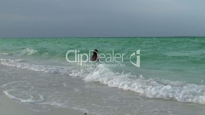 Girl swimming in the Caribbean Sea. Cuba, Cayo Largo