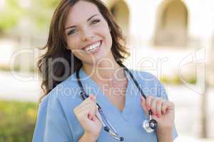 Young Adult Woman Doctor or Nurse Portrait Outside