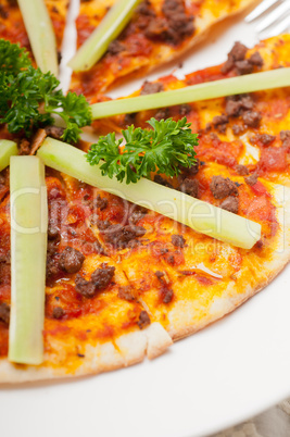 Turkish beef pizza with cucumber on top