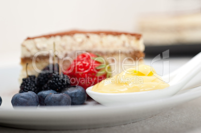 tiramisu dessert with berries and cream